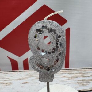 VELA NUMERO 9 GIBREADA CON PALITO 20 CM PLATEADO IMP