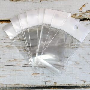 Bolsas de Polipropileno con Adhesivo y para Colgar  5x5 cm. x 100 unid.